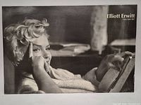 Full view of poster front with photographer credit