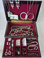 overview of opened jewelry box showing contents