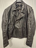 Full front view of jacket showing overall style and tag