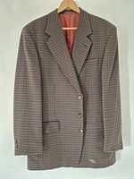 Full view of blazer on hanger