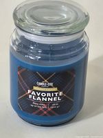 Front view showing label and wax color