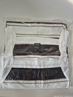 Folded striped shirt sealed in plastic