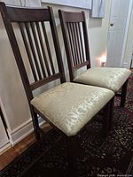 Two wooden side chairs front view