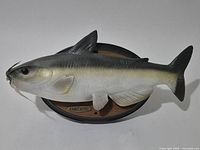 Full view of singing catfish plaque