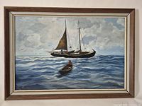 Full view of framed seascape oil painting