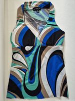 Front view of INC sleeveless top showing pattern and style