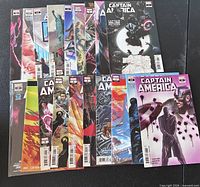 18 Captain America Marvel comic books laid out showing covers and issue numbers