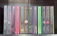Front spines of 13 Charley Davidson series paperbacks arranged left to right in numerical order