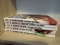 Stack of five Image Comics graphic novels showing titles on spines