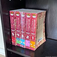 Front spines of Fairy Tail Master's Edition volumes 1-5 on shelf