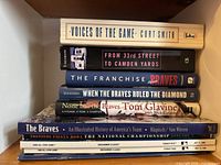 Stack of ten Braves and MLB books and programs