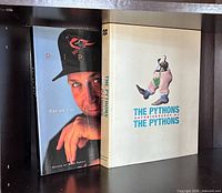 Front view of Ripken: Cal on Cal and The Pythons books standing on shelf