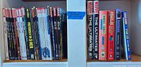 All 38 graphic novels arranged on shelf showing spines