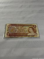 Obverse of 1974 $2 bill in sleeve