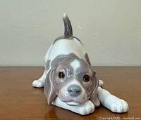 Front view of porcelain puppy figurine