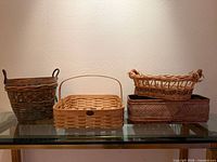 All four wicker baskets front view on shelf