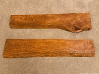 Two wooden boards on carpet, full view
