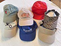 All six headwear items grouped