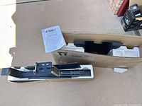 Overall lot showing WorkFit-S components in original box with manual visible