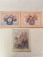 Group shot of all three floral lithograph prints