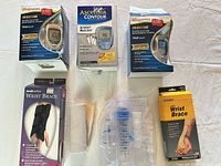 Overview of all boxed glucose meters, wrist braces, spirometer, bandage