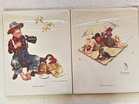 Both shrink-wrapped prints side by side