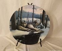 Front of plate displaying wolf artwork