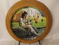 Front of framed collector plate showing artwork