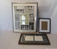 All three picture frames standing and lying flat to show sizes, colors, mat styles