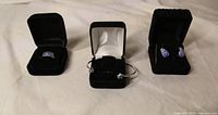 Ring, bracelet and earrings each in black velvet boxes