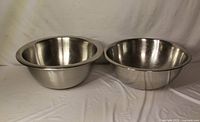 Shows both stainless steel mixing bowls side by side