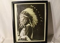 Framed photograph of Sioux man in headdress