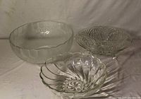 Group shot of all three clear glass bowls showing sizes and patterns