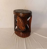 full view showing carved fish body and overall form