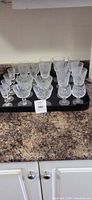 Full tray of assorted crystal stemware and dessert bowls