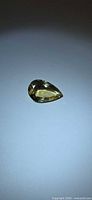 Pear-cut vivid golden Heliodor gemstone, top view