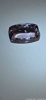 Front view of cushion cut amethyst showing overall shape and faceting