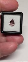 Pear-cut purple tourmaline in display box