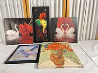 All five art pieces grouped on tabletop