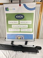 Front view of assembled banner stand with bag and pole