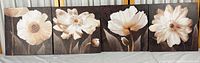 All four floral canvas panels side by side