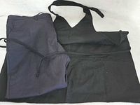 Apron and pants laid flat together