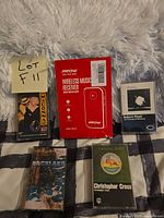 Group shot showing Mpow receiver box and four cassette tapes