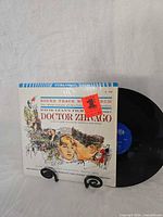 Front view of Doctor Zhivago soundtrack LP showing sleeve art and vinyl disc partly exposed
