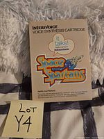 Front of boxed Space Spartans Intellivoice game