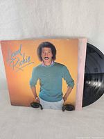 Front sleeve and record partially visible