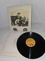 Front album cover and vinyl record on inner sleeve