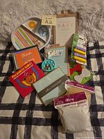 All nine new baby-related items arranged on surface