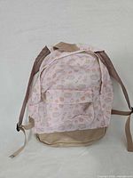 Front view of pink backpack showing pattern and structure