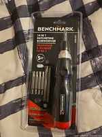 Front of sealed Benchmark 14-in-1 ratcheting screwdriver package
